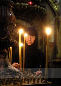 The Orthodox Christian Woman in the Church of the Resurrection in Jerusalem