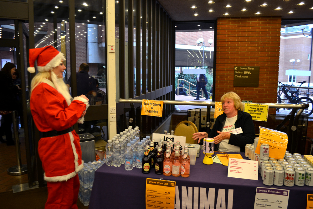 Santa next to the stand of Animal Aid with Vegan drinks (water, ginger beer etc.). Photo: Barbora Sajmovicova, 2015. 